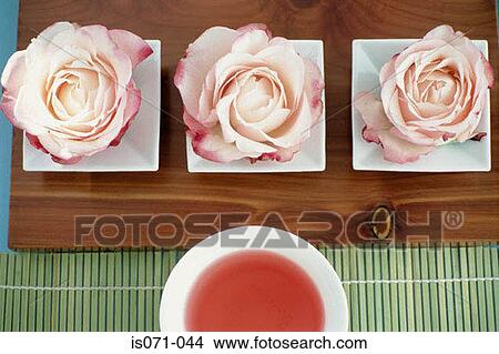 Roses and tea View Large Photo Image Picture - Roses and tea. Fotosearch