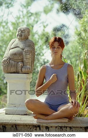 Woman meditating View Large Photo Image Stock Image - Woman meditating. Fotosearch