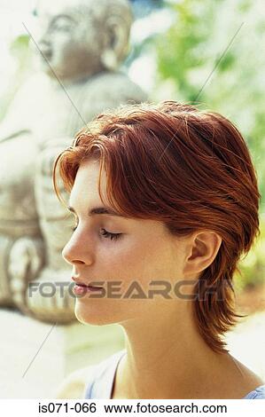 Woman meditating View Large Photo Image Stock Photograph - Woman meditating. Fotosearch