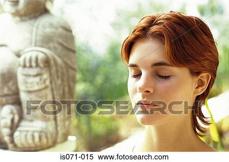 Stock Photography - Woman meditating. Fotosearch