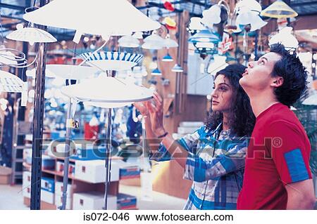 Couple in shop View Large Photo Image Stock Photograph - Couple in shop. Fotosearch