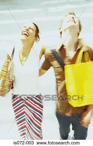 Stock Image - Couple shopping. Fotosearch