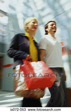 Couple shopping View Large Photo Image Stock Image - Couple shopping. Fotosearch