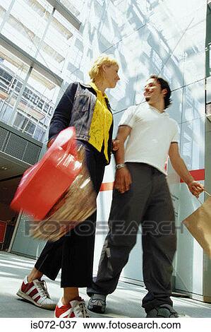 Couple shopping View Large Photo Image Stock Photo - Couple shopping. Fotosearch