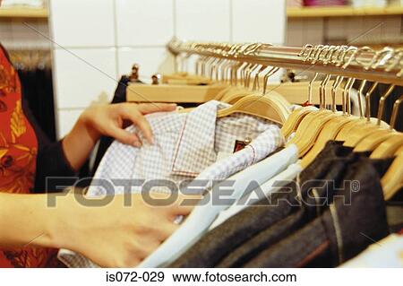 Shopping for clothes View Large Photo Image Stock Photo - Shopping for clothes. Fotosearch