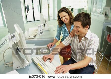 Couple at computer View Large Photo Image Stock Photograph - Couple at computer. Fotosearch