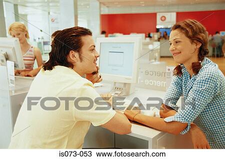 Couple in cybercafe View Large Photo Image Stock Image - Couple in cybercafe. Fotosearch