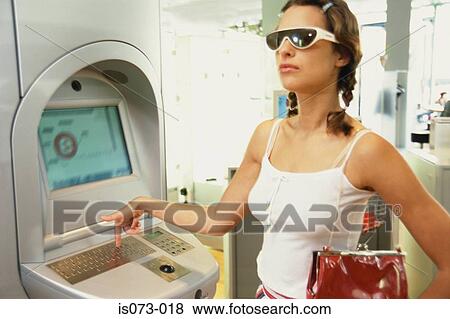 Girl at Internet terminal View Large Photo Image Stock Photo - Girl at Internet terminal. Fotosearch