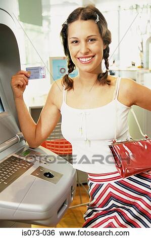 Girl at Internet terminal View Large Photo Image Stock Photograph - Girl at Internet terminal. Fotosearch