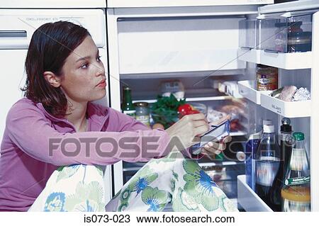 Girl in kitchen View Large Photo Image Stock Image - Girl in kitchen. Fotosearch