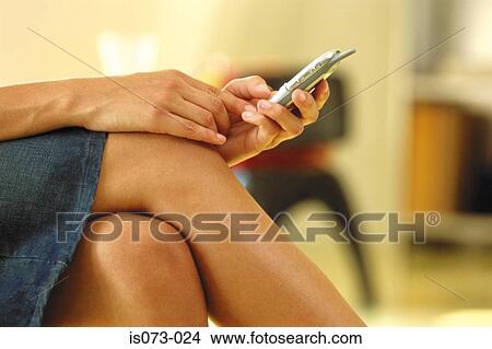 Girl with mobile phone View Large Photo Image Picture - Girl with mobile phone. Fotosearch