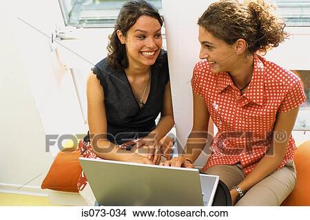 Girls at computer View Large Photo Image Picture - Girls at computer. Fotosearch