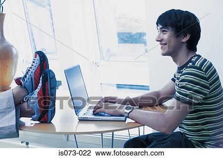 Stock Image - Man at computer. Fotosearch