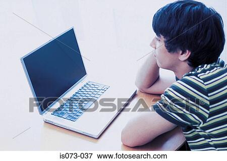 Man at computer View Large Photo Image Stock Photo - Man at computer. Fotosearch