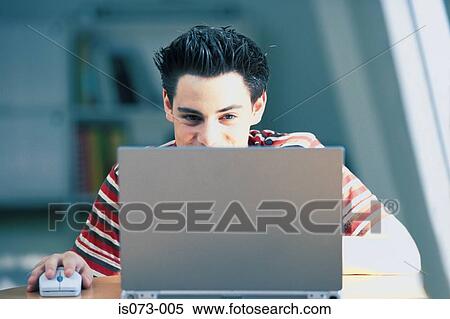 Man at computer View Large Photo Image Stock Photography - Man at computer. Fotosearch