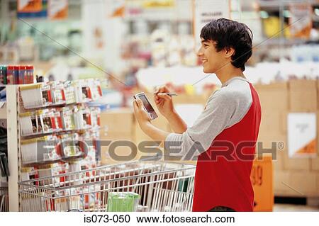 Man in superstore View Large Photo Image Stock Image - Man in superstore. Fotosearch