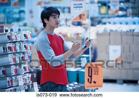 Stock Photo - Man in superstore. Fotosearch