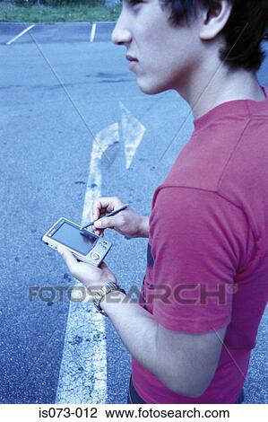 Man with pocket PC View Large Photo Image Stock Image - Man with pocket PC. Fotosearch