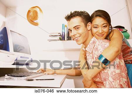 Couple at computer View Large Photo Image Stock Photograph - Couple at computer. Fotosearch