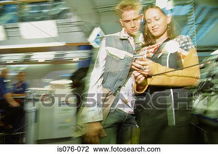 Couple in mobile phone shop View Large Photo Image Stock Image - Couple in mobile phone shop. Fotosearch