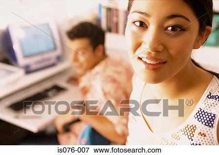 Stock Photo - Couple with computer. Fotosearch