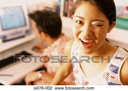 Stock Image - Girl winking. Fotosearch