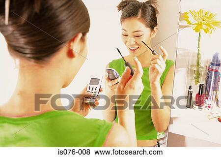 Girl with mascara View Large Photo Image Stock Photo - Girl with mascara. Fotosearch