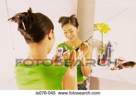 Girl with mobile phone View Large Photo Image Stock Photography - Girl with mobile phone. Fotosearch