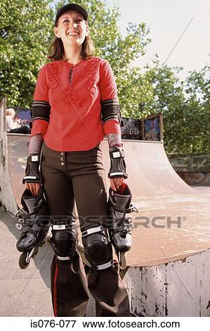 Girl with rollerblades View Large Photo Image Stock Photo - Girl with rollerblades. Fotosearch