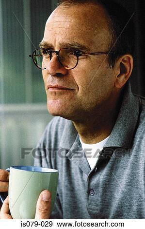 Man drinking coffee View Large Photo Image Stock Photo - Man drinking coffee. Fotosearch