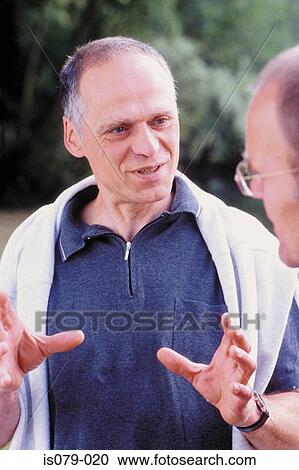 Men talking View Large Photo Image Stock Image - Men talking. Fotosearch