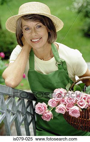 Woman gardening View Large Photo Image Stock Photography - Woman gardening. Fotosearch
