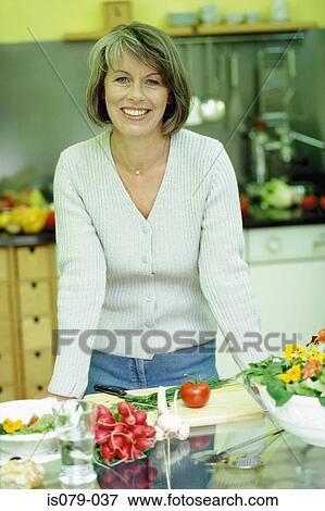 Woman in kitchen View Large Photo Image Stock Photo - Woman in kitchen. Fotosearch