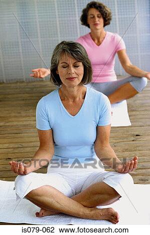 Women meditating View Large Photo Image Stock Image - Women meditating. Fotosearch