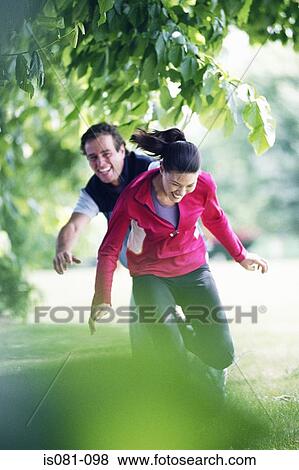 Couple outdoors View Large Photo Image Stock Photo - Couple outdoors. Fotosearch
