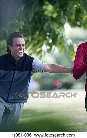 Couple outdoors View Large Photo Image Stock Photograph - Couple outdoors. Fotosearch