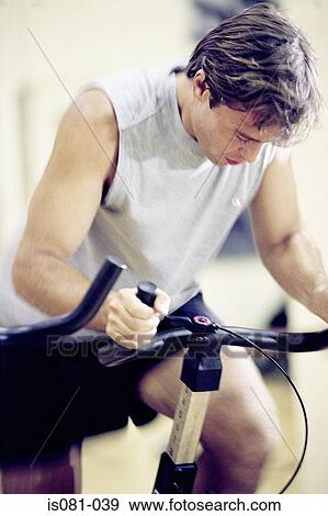Man cycling View Large Photo Image Stock Photo - Man cycling. Fotosearch
