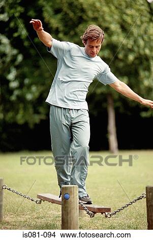 Man on obstacle course View Large Photo Image Picture - Man on obstacle course. Fotosearch