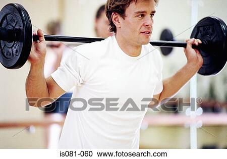 Man weight-lifting View Large Photo Image Stock Image - Man weight-lifting. Fotosearch