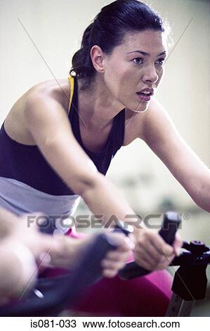 Woman cycling View Large Photo Image Stock Image - Woman cycling. Fotosearch