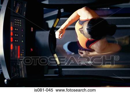 Woman on treadmill View Large Photo Image Stock Photography - Woman on treadmill. Fotosearch