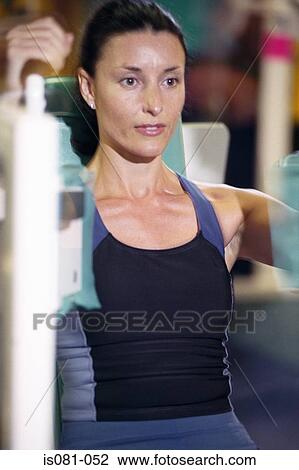 Woman weight-training View Large Photo Image Stock Image - Woman weight-training. Fotosearch