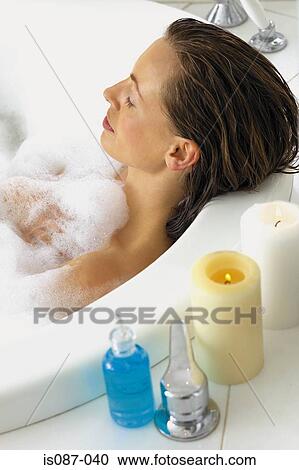 Stock Image - Woman in bath. Fotosearch