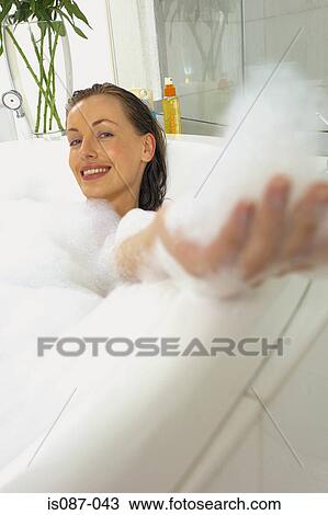 Woman in bath View Large Photo Image Stock Image - Woman in bath. Fotosearch