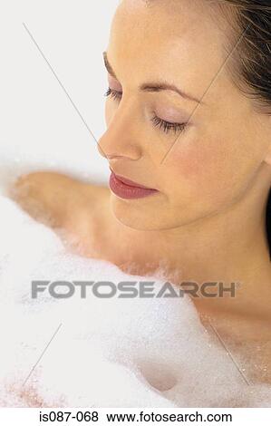 Stock Photo - Woman in bath. Fotosearch