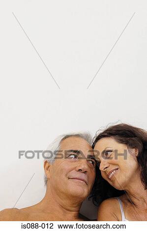 Stock Image - Couple in bed. Fotosearch