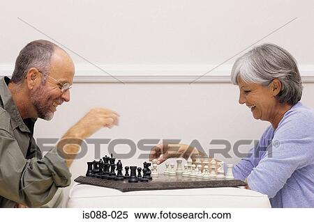 Stock Photography - Couple on sofa. Fotosearch