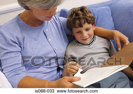 Grandmother and grandchild on sofa View Large Photo Image Stock Image - Grandmother and grandchild on sofa. Fotosearch