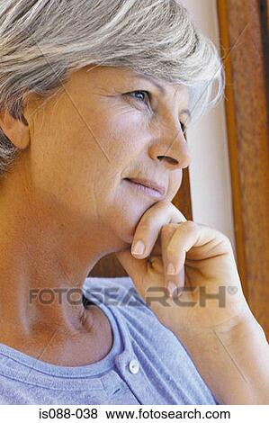 Woman in a pensive pose View Large Photo Image Stock Photo - Woman in a pensive pose. Fotosearch