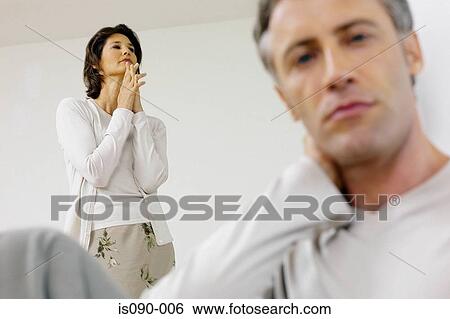 Stock Photograph - Man and woman arguing. Fotosearch